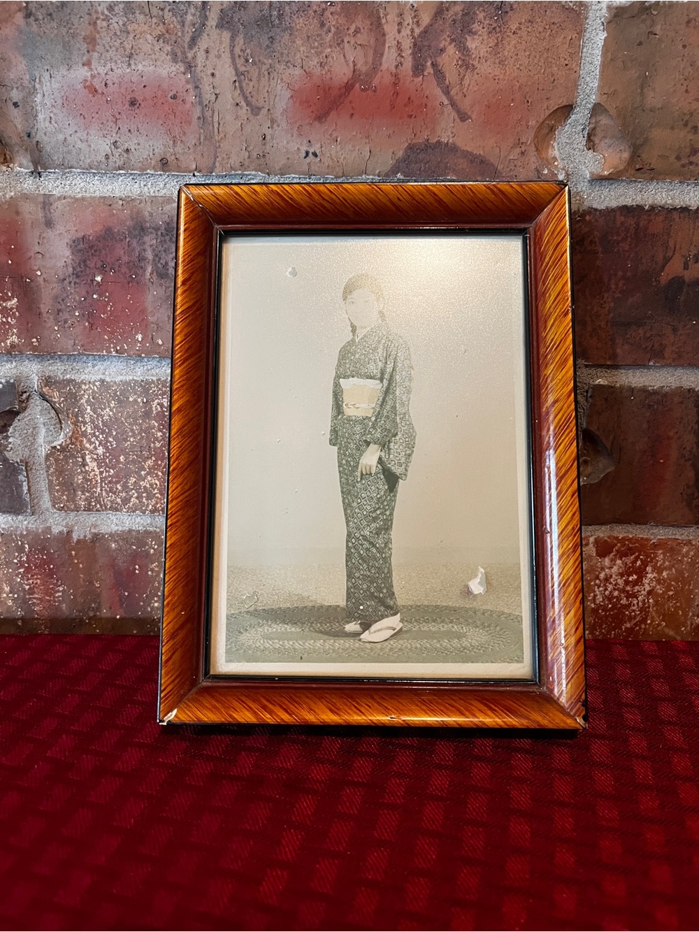 vintage framed portrait photograph of an individual wearing a traditional garmen